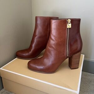 Pair of Michael Kors leather heels boots